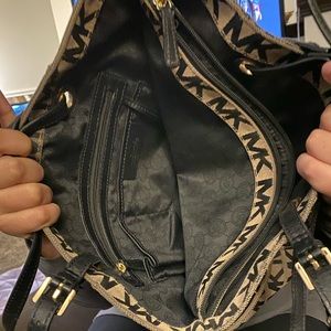 I’m selling a Mk purse for $55